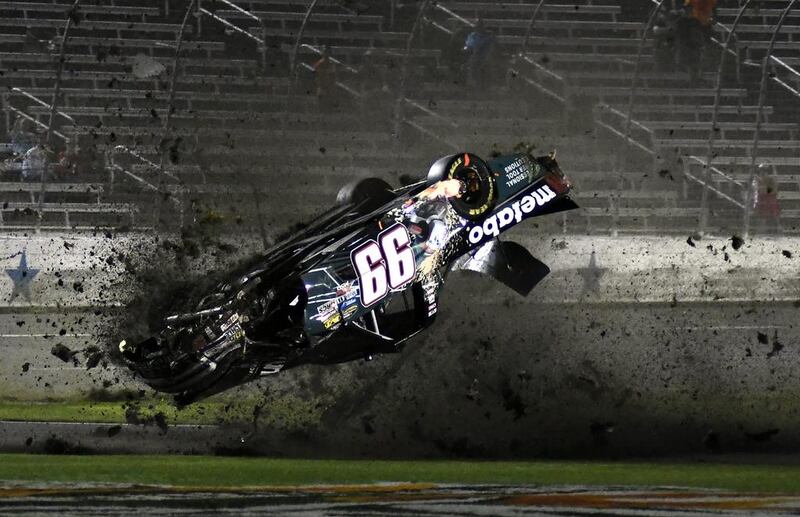 Timothy Peters flips coming down the front stretch during the Nascar Trucks auto race at Texas Motor Speedway. Larry Papke / AP Photo