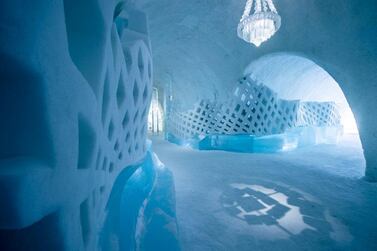 An Ice chandelier hangs in the main hall, designed by Marjolein Vink and Maurizio Perron. Courtesy Asaf Kliger / Icehotel