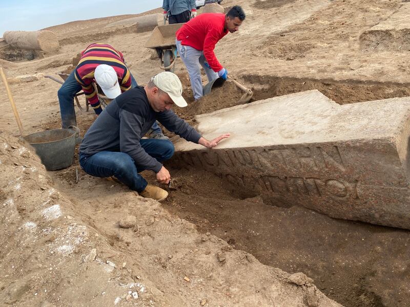 Antiquities workers at the Pelusium site, in the Tell El Farma region of North Sinai, Egypt, unearth part of an archway into a temple to the god Zeus Cassius.