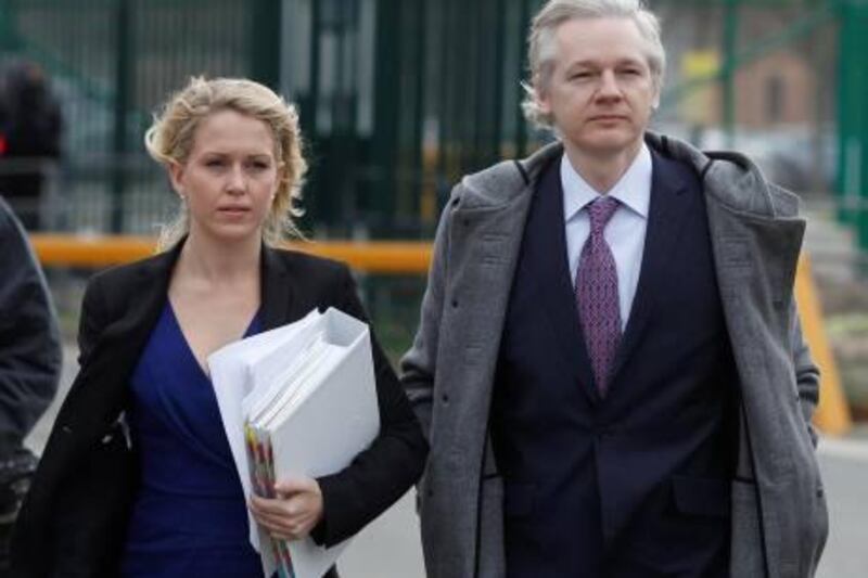 Wikileaks founder Julian Assange (R) and lawyer Jennifer Robinson arrive at Belmarsh Magistrates' Court in London February 7, 2011. Assange will try to persuade a British judge on Monday to block his extradition to Sweden to face trial for sex crimes, arguing he could end up facing execution in the United States.   REUTERS/Andrew Winning  (BRITAIN - Tags: POLITICS CRIME LAW) *** Local Caption ***  AWI03_WIKILEAKS-ASS_0207_11.JPG