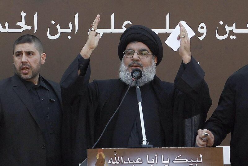 Hassan Nasrallah gives a speech in Beirut on November 14, 2013. Nasrallah said in an interview published on April 7, 2014 that his Lebanese Shiite group was behind a blast that targeted Israeli troops on the border between the two countries last month. Anwar Amro / AFP Photo