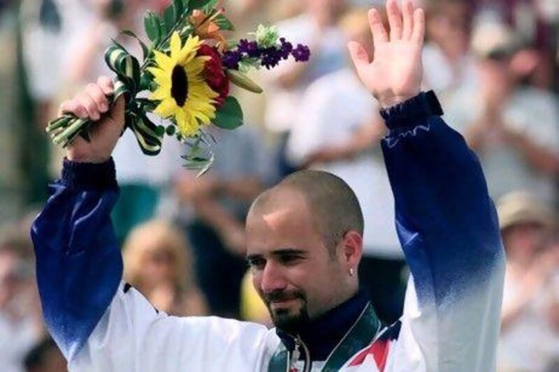 America's Andre Agassi says winning the gold medal at Atlanta in 1996 is the highlight of his career.