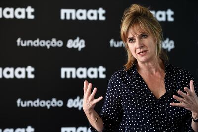 The architect of the MAAT museum ((Museum of Art, Architecture and Technology) Amanda Levete gives a press conference during a boat ride on the Tagus River in Lisbon on October 3, 2016. - The MAAT museum will open for public on October 5, 2016. (Photo by PATRICIA DE MELO MOREIRA / AFP)