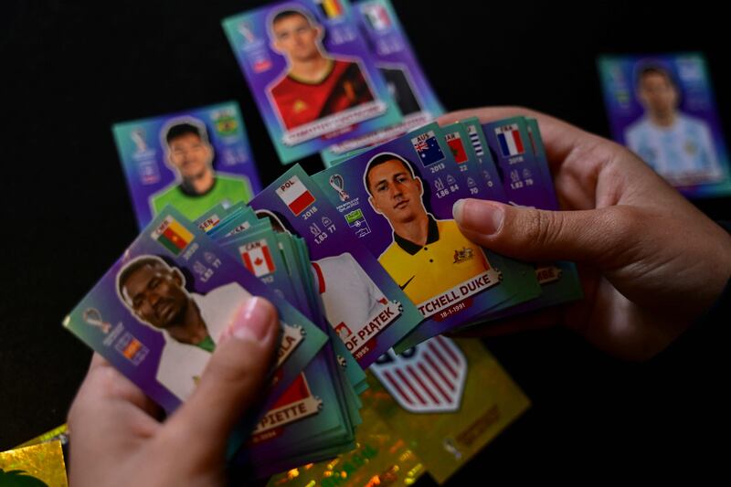 A person exchanges Panini World Cup football stickers in Santiago. AFP