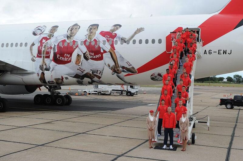 The Arsenal squad prepare to travel on their customised aircraft. Stuart MacFarlane / Arsenal FC via Getty Images