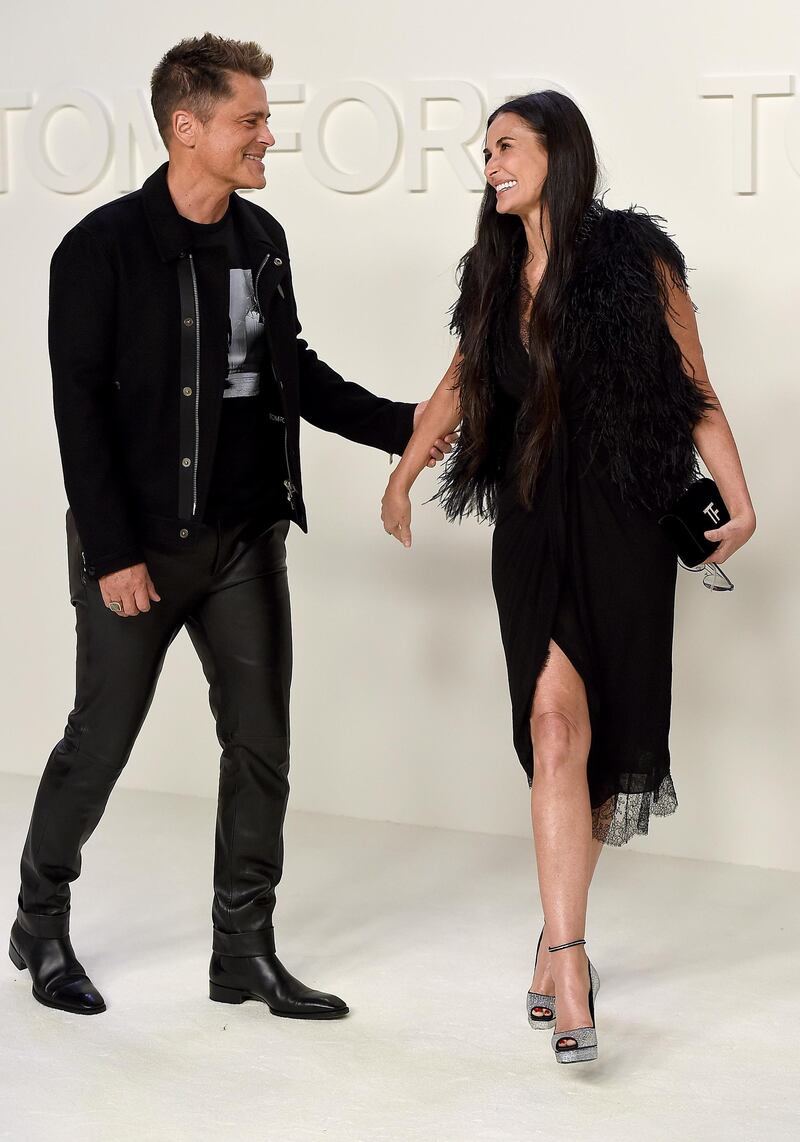Rob Lowe and Demi Moore attend the Tom Ford show during New York Fashion Week on February 7, 2020, in Los Angeles. AP