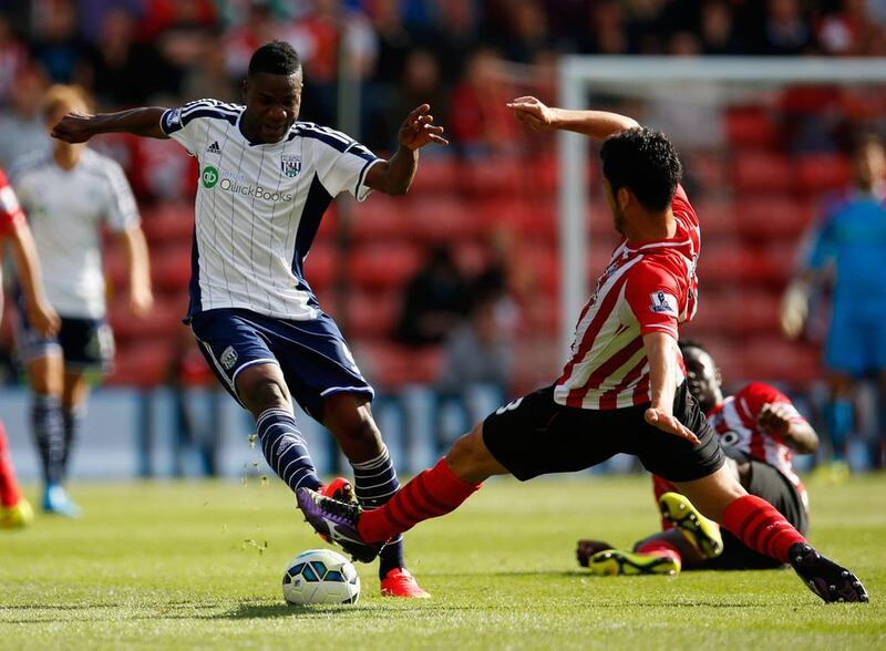 Brown Ideye of West Brom is tackled by Jack Cork of Southampton during the Barclays Premier League match between Southampton and West Bromwich Albion at St Mary’s Stadium on August 23, 2014 in Southampton, England. (Photo by Steve Bardens/Getty Images)