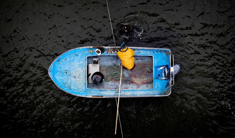 A fisherman prepares to set sail in Pontedeume, Galicia, northern Spain. Cabalar / EPA