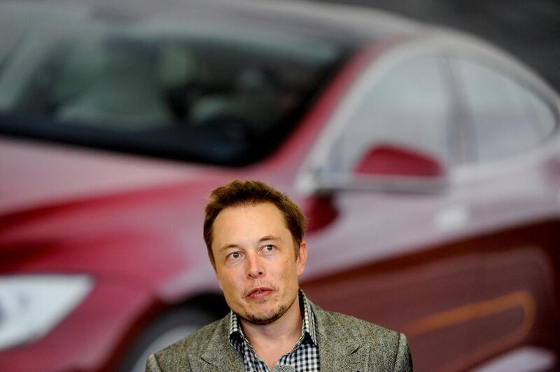 FILE PHOTO: Tesla Chief Executive Office Elon Musk speaks at his company's factory in Fremont, California, U.S., June 22, 2012.   REUTERS/Noah Berger/File Photo