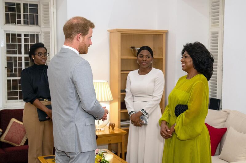 Prince Harry meets Angolan First Lady Ana Dias Lourenco at a reception at the British Ambassadors Residence in Luanda, Angola, on September 27, 2019. EPA