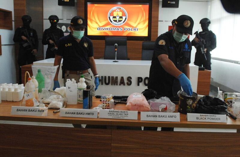 Indonesian officers display seized bomb-making materials at the national police headquarters in Jakarta on November 25, 2016. Dasril Roszandi / NurPhoto