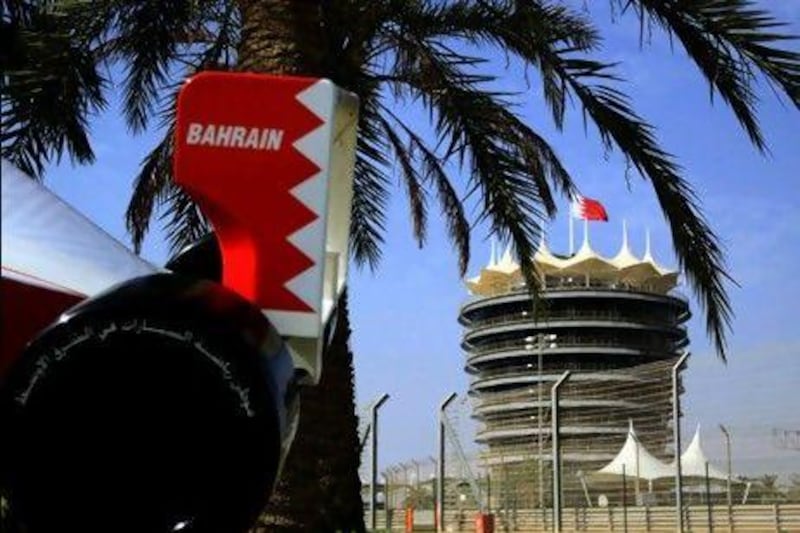 A model of a Formula 1 car is displayed in front of the Bahrain International Circuit tower. The postponement of the Formula 1 Bahrain Grand Prix has been a blow to the economy. AP Photo
