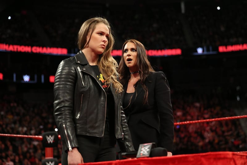 Ronda Rousey, left, will face Nikki Bella for the Raw Women's title at WWE Evolution. Image courtesy of WWE