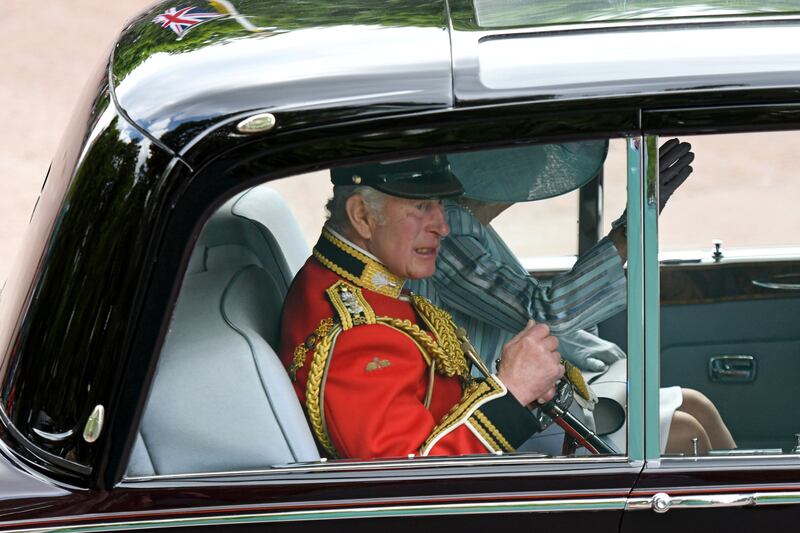 Prince Charles being driven to the parade. Getty