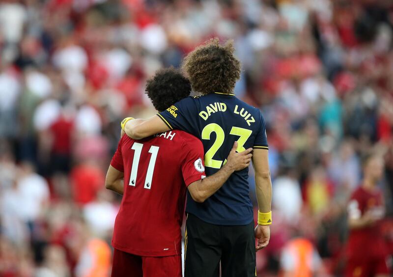 Salah with Arsenal's David Luiz post-match. Reuters