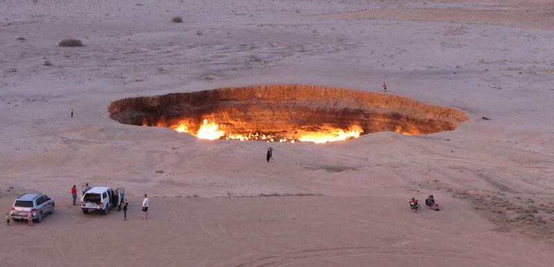 People visiting “The Gateway to Hell,” a huge burning gas crater in the heart of Turkmenistan’s Karakum desert. The fiery pit was the result of a simple miscalculation by Soviet scientists in 1971 after their boring equipment suddenly drilled through into an underground cavern and a deep sinkhole formed. Fearing that the crater would emit poisonous gases, the scientists took the decision to set it alight, Igor Sasin / AFP 