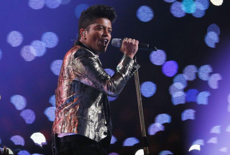 Bruno Mars performs during the Super Bowl halftime show. Kevin C Cox / Getty Images/ AFP 