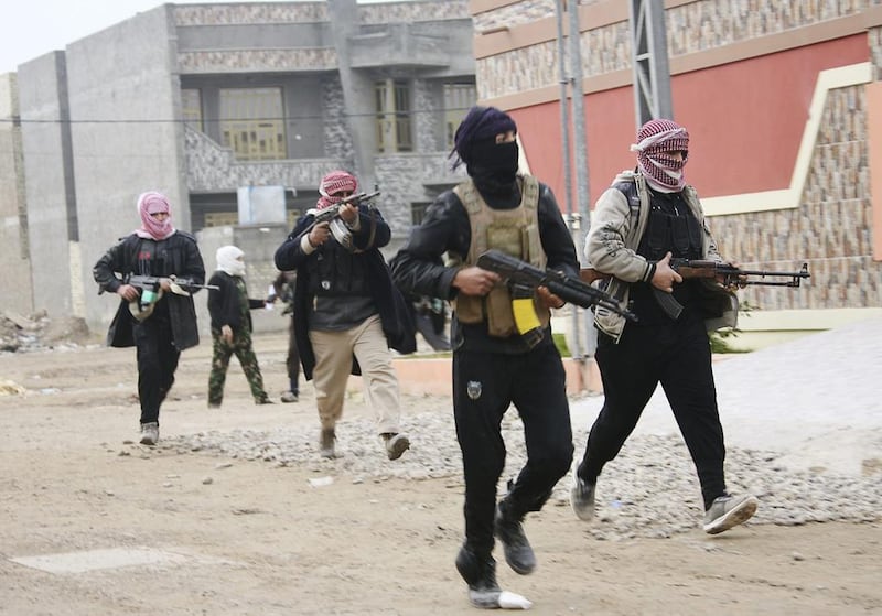 Tribal fighters who have been deployed onto the streets, patrol in the city of Fallujah, 50-kilometres west of Baghdad on January 5, 2014. Government officials in western Anbar province met tribal leaders to urge them to help repel Al Qaeda-linked militants who have taken over parts of Ramadi and Fallujah, strategic Iraqi cities on the Euphrates River. Reuters