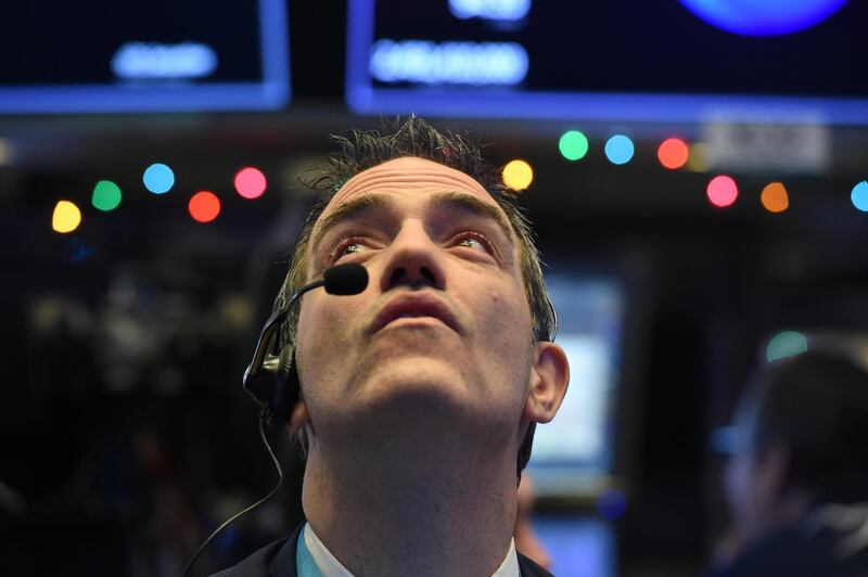 A trader looks on while waiting for the initial price of Tencent Music Entertainment company's IPO on the floor of the New York Stock Exchange (NYSE) in New York, U.S., December 12, 2018. REUTERS/Bryan R Smith