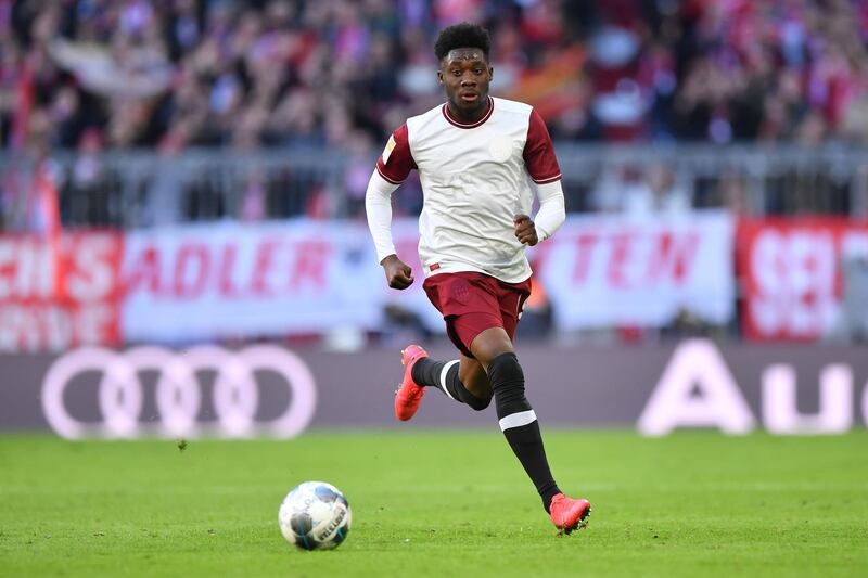 MUNICH, GERMANY - MARCH 08: Alphonso Davies of Bayern Muenchen plays the ball during the Bundesliga match between FC Bayern Muenchen and FC Augsburg at Allianz Arena on March 08, 2020 in Munich, Germany. (Photo by Sebastian Widmann/Bongarts/Getty Images)