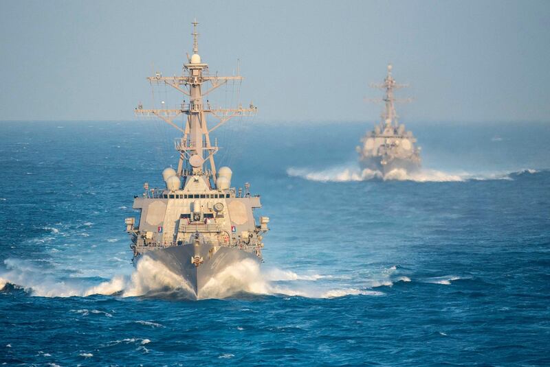 US Navy Arleigh Burke-class guided missile destroyers USS Ramage and USS Gonzalez transiting the Strait of Bab Al Mandeb on February 13, 2016 in the Arabian Gulf. US navy photo/Alamy Stock Photo