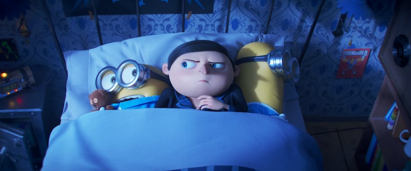 From left: Minion Bob, Gru (voiced by Steve Carell) and Minion Kevin in a scene from the film.