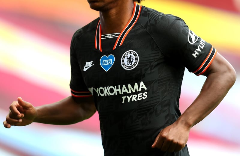 Willian of Chelsea with the the NHS logo on his shirt. Getty