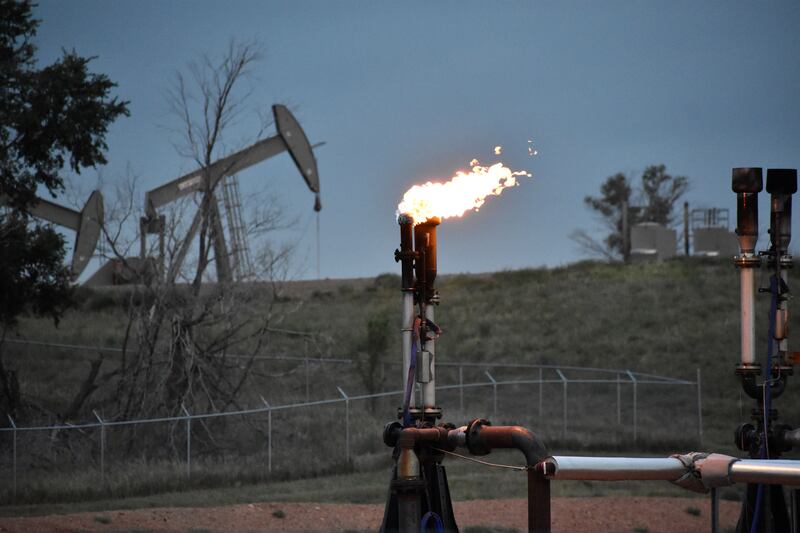 Burning methane from oil production near Watford City, North Dakota. Fossil fuels made up nearly 82 per cent of the total global energy supply in 2022. AP