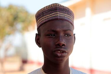 Muhammed Abubakar, a 15-year-old boy who escaped from men who kidnapped hundreds of students from his school, looks on in Kankara, in northwestern Katsina state, Nigeria December 14, 2020. Reuters