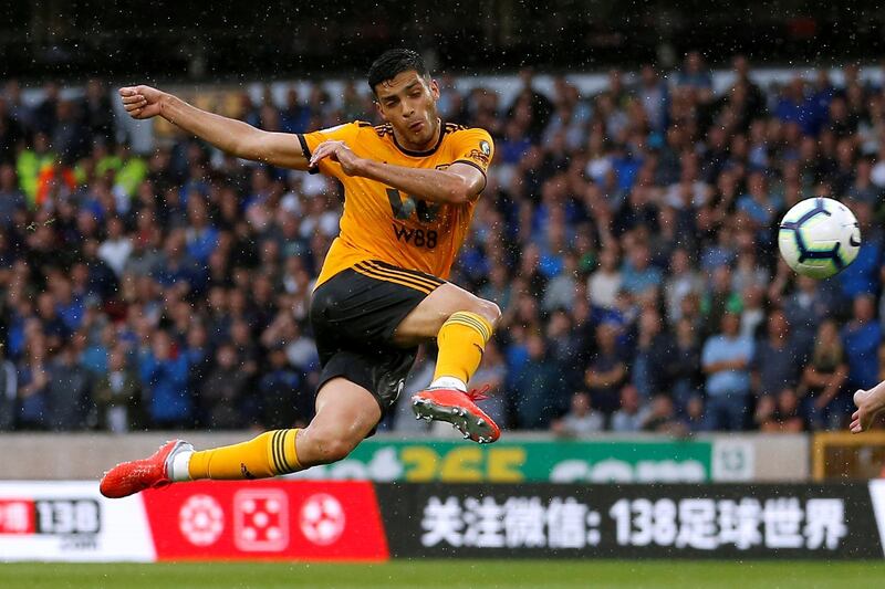 Soccer Football - Premier League - Wolverhampton Wanderers v Everton - Molineux Stadium, Wolverhampton, Britain - August 11, 2018   Wolverhampton Wanderers' Raul Jimenez shoots at goal     Action Images via Reuters/Craig Brough    EDITORIAL USE ONLY. No use with unauthorized audio, video, data, fixture lists, club/league logos or "live" services. Online in-match use limited to 75 images, no video emulation. No use in betting, games or single club/league/player publications.  Please contact your account representative for further details.      TPX IMAGES OF THE DAY