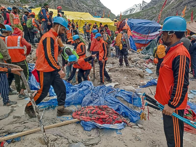 Rescuers search for survivors. Reuters