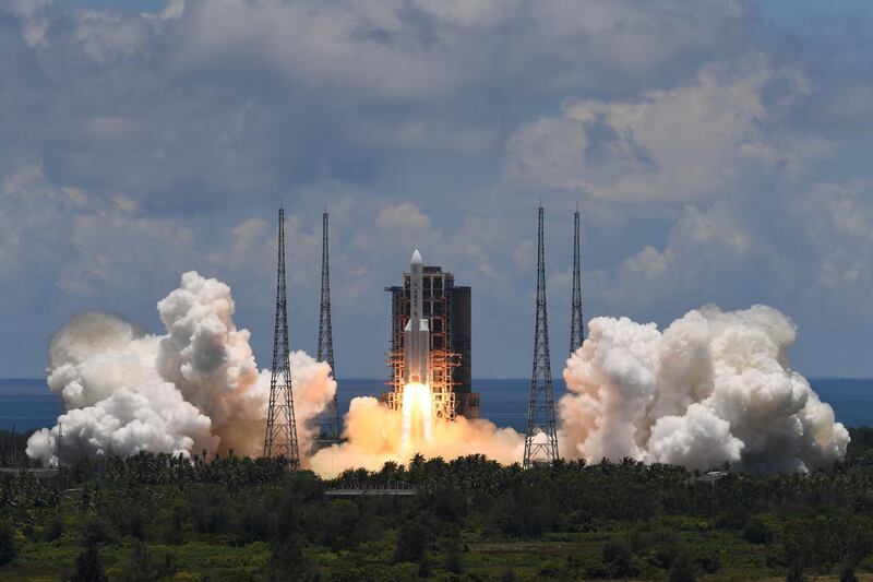 A Long March-5 rocket, carrying an orbiter, lander and rover as part of the Tianwen-1 mission to Mars, lifts off from the Wenchang Space Launch Centre in southern China's Hainan Province in 2020.  AFP