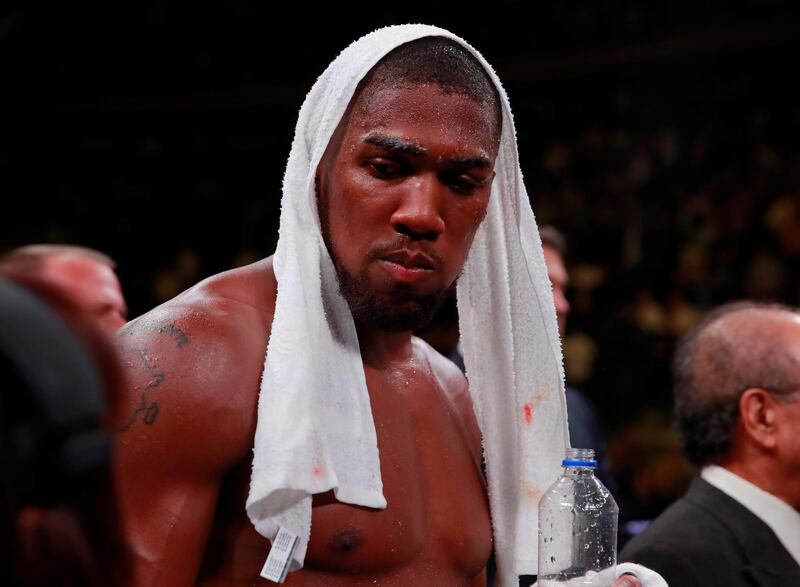 Boxing - Anthony Joshua v Andy Ruiz Jr - WBA Super, IBF, WBO & IBO World Heavyweight Titles - Madison Square Garden, New York, United States - June 1, 2019   Anthony Joshua looks dejected after losing the fight  Action Images via Reuters/Andrew Couldridge