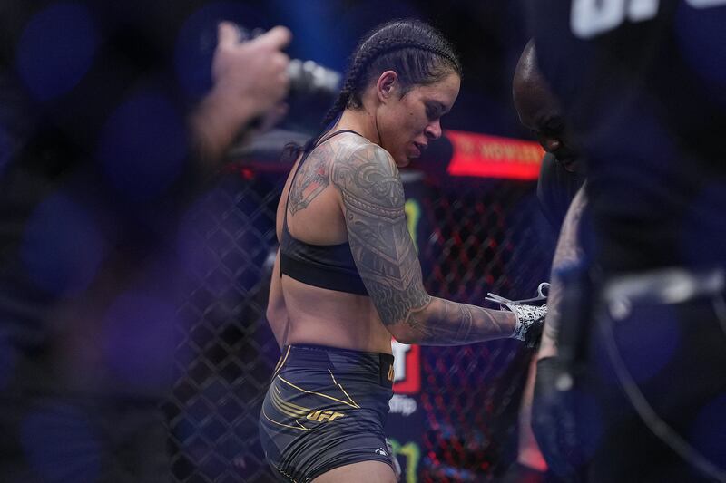 Amanda Nunes reacts following her loss by submission against Julianna Pena at UFC 269. Reuters