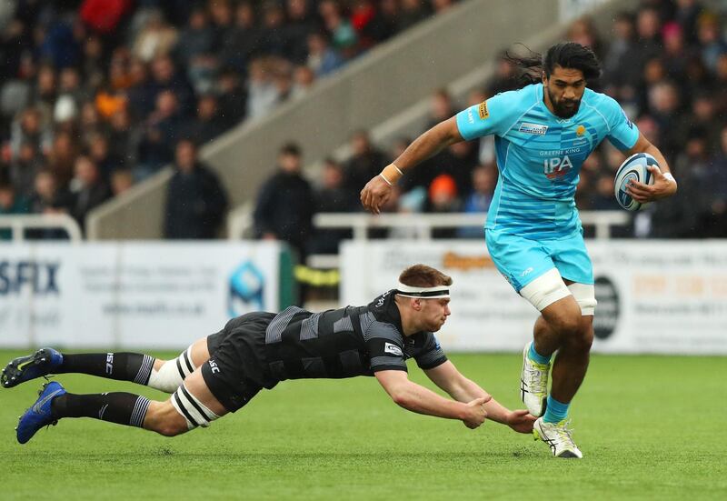 NEWCASTLE UPON TYNE, ENGLAND - MARCH 03:  Michael Fatialofa of Worcester Warriors evades Callum Chick of Newcastle Falcons during the Gallagher Premiership Rugby match between Newcastle Falcons and Worcester Warriors at Kingston Park on March 03, 2019 in Newcastle upon Tyne, United Kingdom. (Photo by David Rogers/Getty Images)