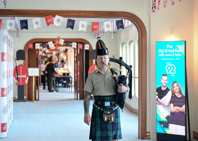 A Scottish bagpipe player serenades guests

