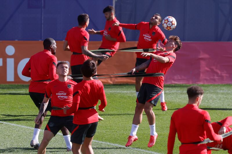 Atletico players during training ahead of the Champions League game with AC Milan. EPA