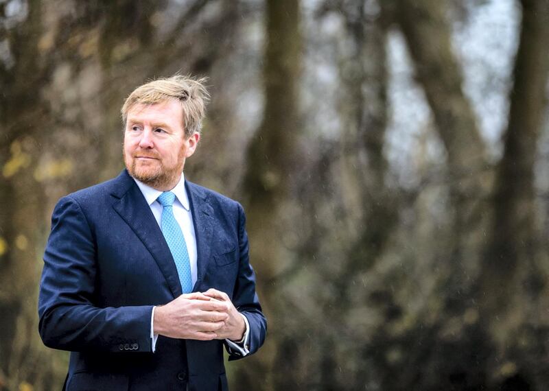 Dutch King Willem-Alexander (R) visits the Willem III Rowing Club to work on covid-19 health measures impacts in sport, in Amsterdam, on December 11, 2020. (Photo by Remko de Waal / ANP / AFP) / Netherlands OUT