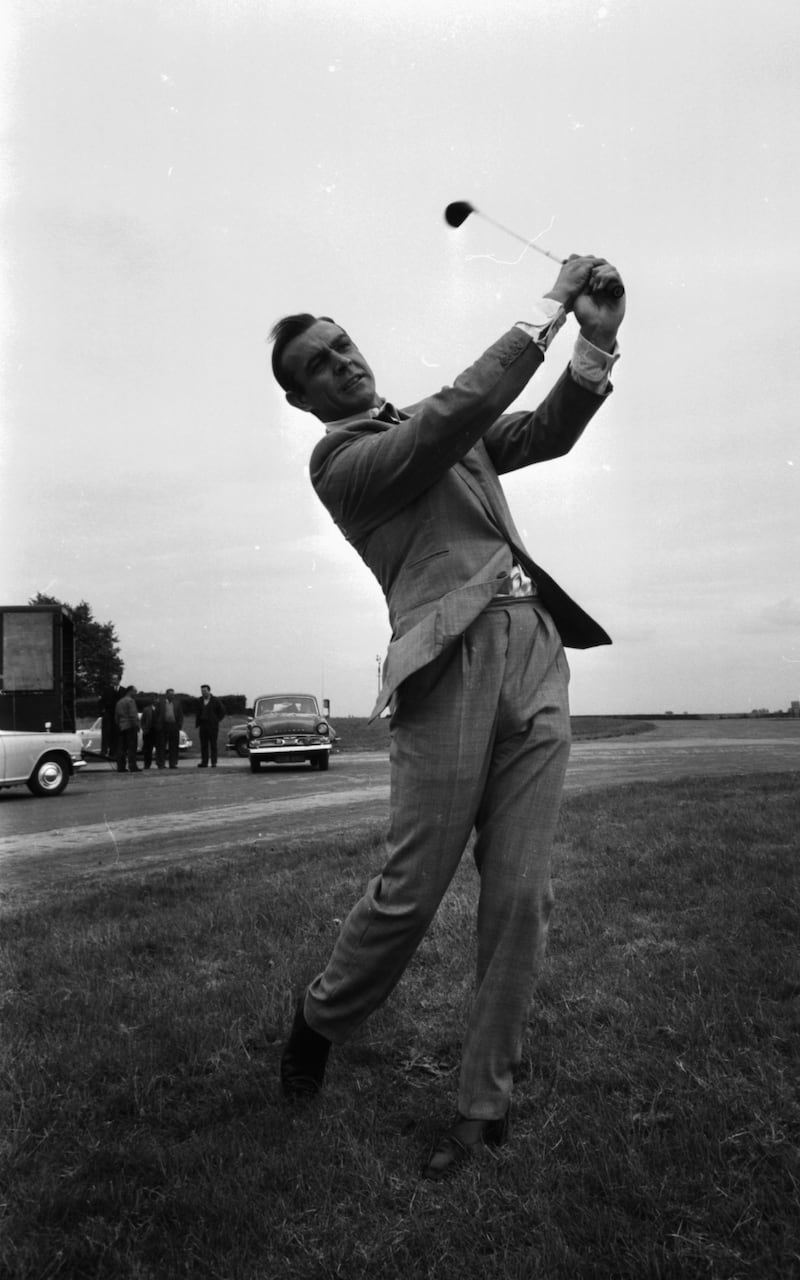 James Bond actor Sean Connery practicing his golf swing at Northolt Airport, May 13th 1964. (Photo by Bob Haswell/Express/Getty Images)