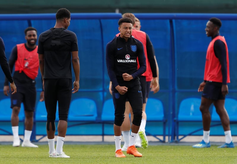 England's Jesse Lingard and team mates during training REUTERS / Lee Smith