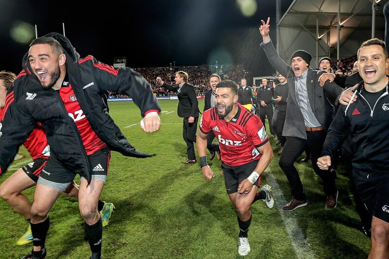 CHRISTCHURCH, NEW ZEALAND - AUGUST 04:  Richie Mo'unga (C) of the Crusaders celebrates after the Super Rugby Final match between the Crusaders and the Lions at AMI Stadium on August 4, 2018 in Christchurch, New Zealand.  (Photo by Martin Hunter/Getty Images)