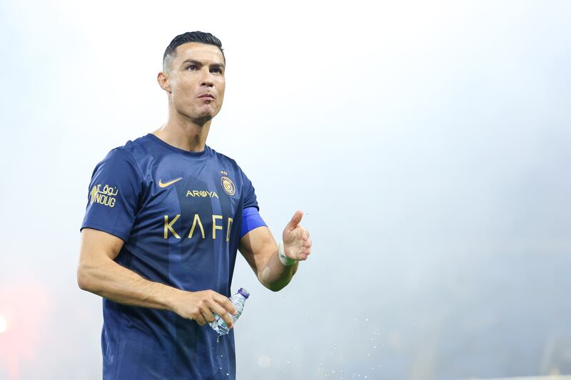 Cristiano Ronaldo takes a quick drink before the start of the game. Getty Images