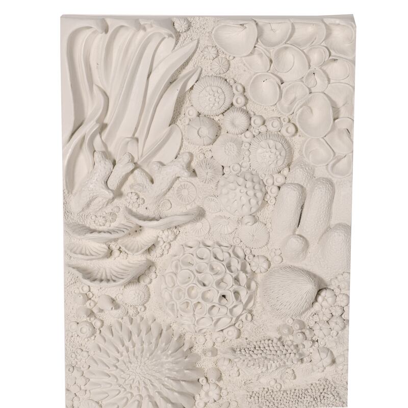 Give a room textural character with ceramic wall bas reliefs or 3D wall art. Photo: Moon
