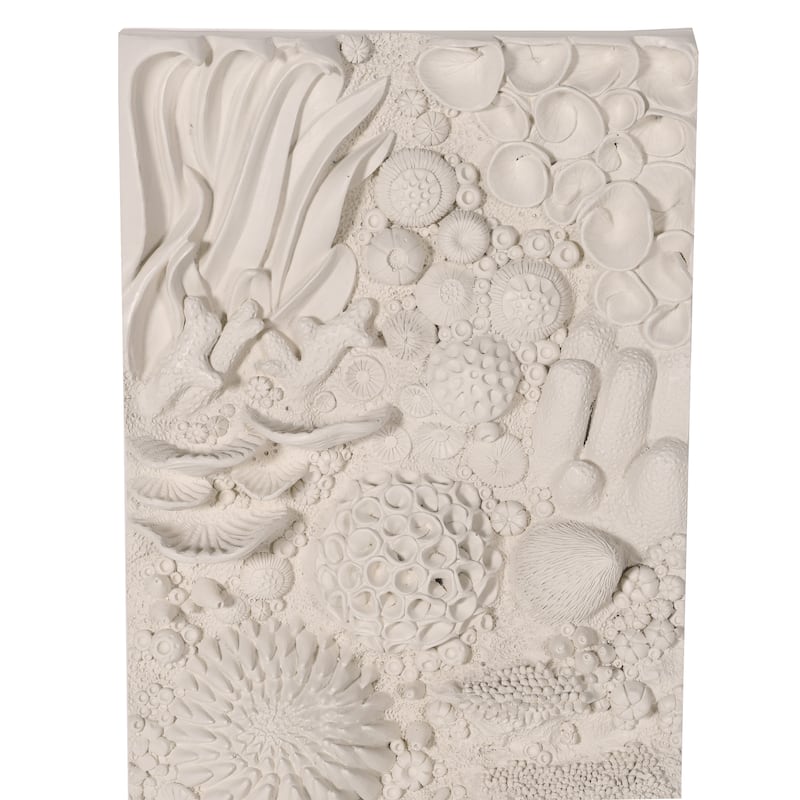 Give a room textural character with ceramic wall bas reliefs or 3D wall art. Photo: Moon