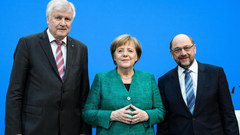 Mr Schulz, right, ditched plans to take the post of foreign minister after fierce criticism from some former allies, not least because he had pledged not to serve in a cabinet with Ms Merkel. Clemens Bilan / EPA