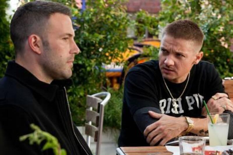 (L-r) BEN AFFLECK as Doug MacRay and JEREMY RENNER as Jem Coughlin in Warner Bros. Pictures' and Legendary Pictures' crime drama "The Town," distributed by Warner Bros. Pictures. Photo by Claire Folger