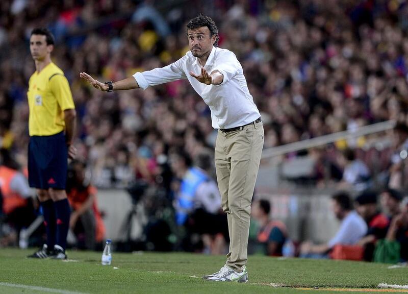 Barcelona manager Luis Enrique gestures during his side's 6-0 friendly win over Leon of Mexico on Monday night. Josep Lago / AFP 