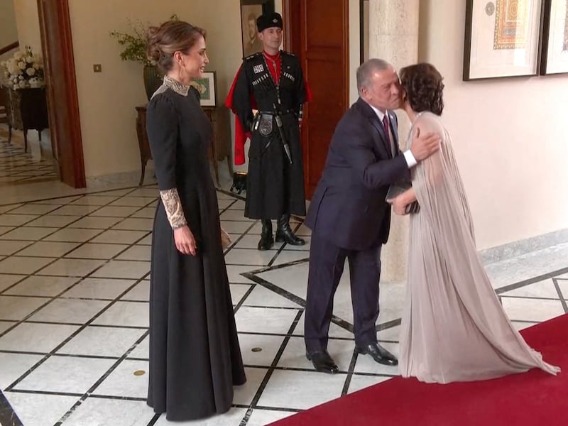 For the wedding, Queen Rania wore a black gown by Dior