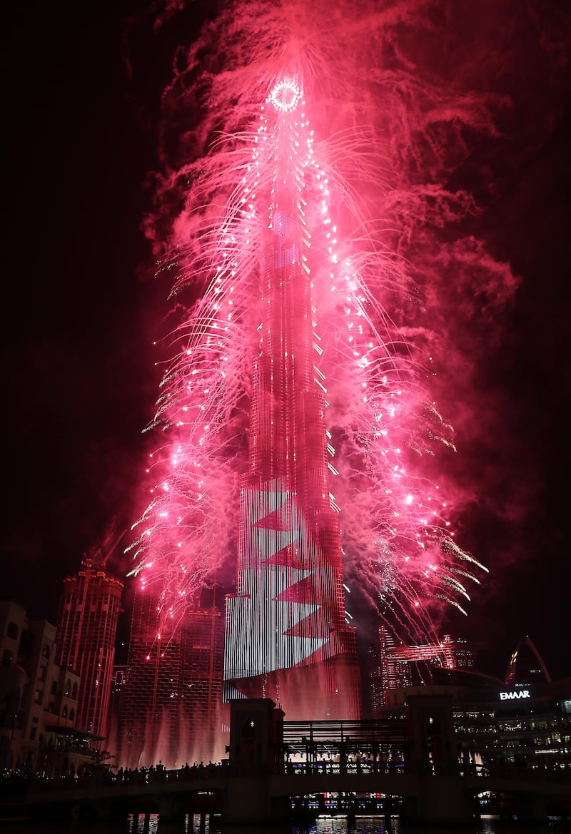 DUBAI , UNITED ARAB EMIRATES – Dec 31 , 2019 : Fireworks display on Burj Khalifa for the new year 2020 celebration at Dubai Mall in Downtown Dubai in Dubai. ( Pawan Singh / The National ) For News/Online/Instagram