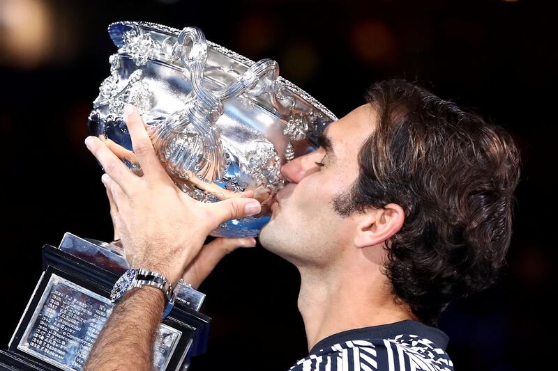MELBOURNE, AUSTRALIA - JANUARY 29:  Roger Federer of Switzerland kisses the Norman Brookes Challenge Cup after winning the Men's Final match against Rafael Nadal of Spain on day 14 of the 2017 Australian Open at Melbourne Park on January 29, 2017 in Melbourne, Australia.  (Photo by Cameron Spencer/Getty Images)